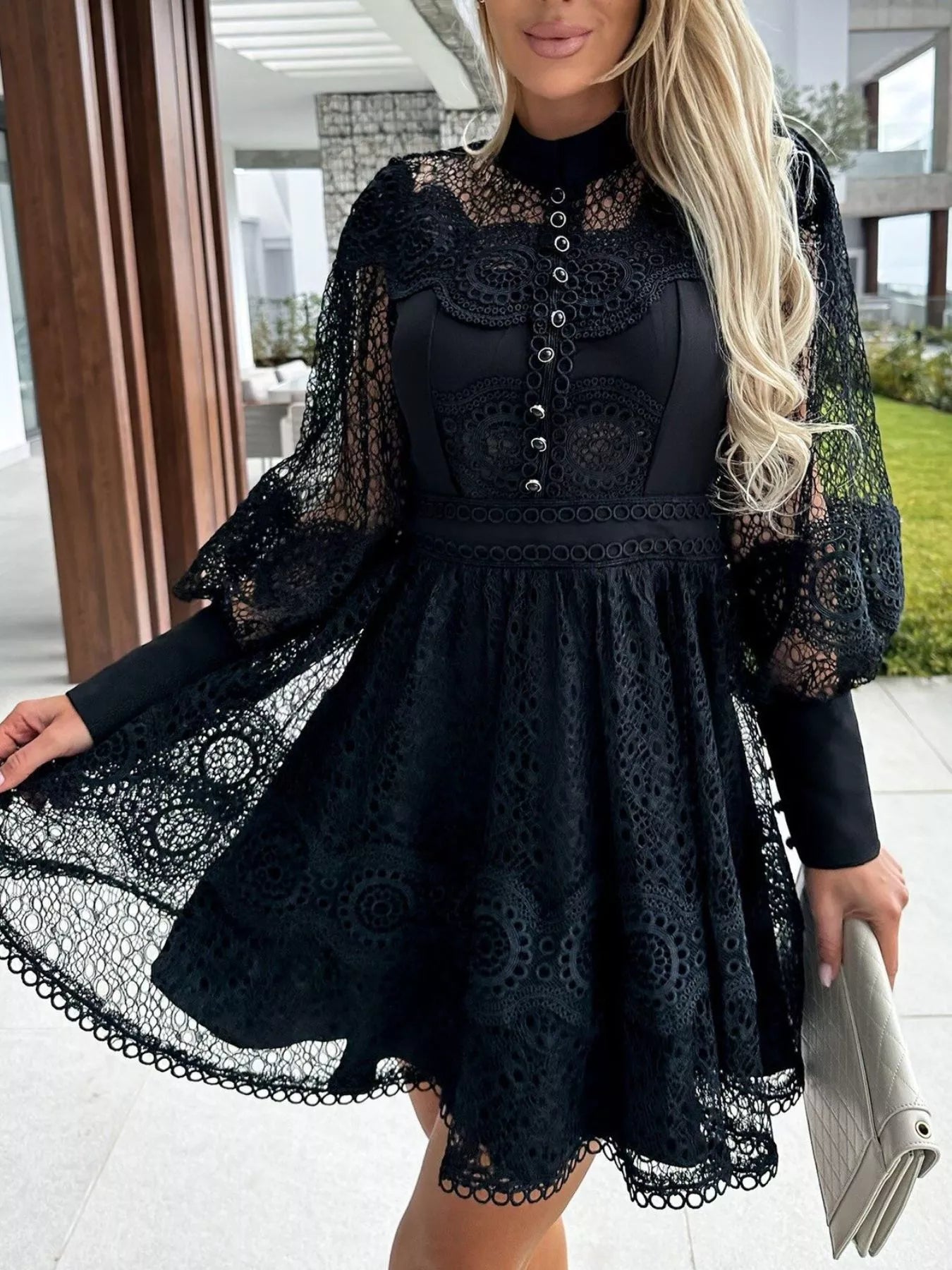 black lace lantern sleeve mini dress with high neckline buttoned bodice and flared skirt