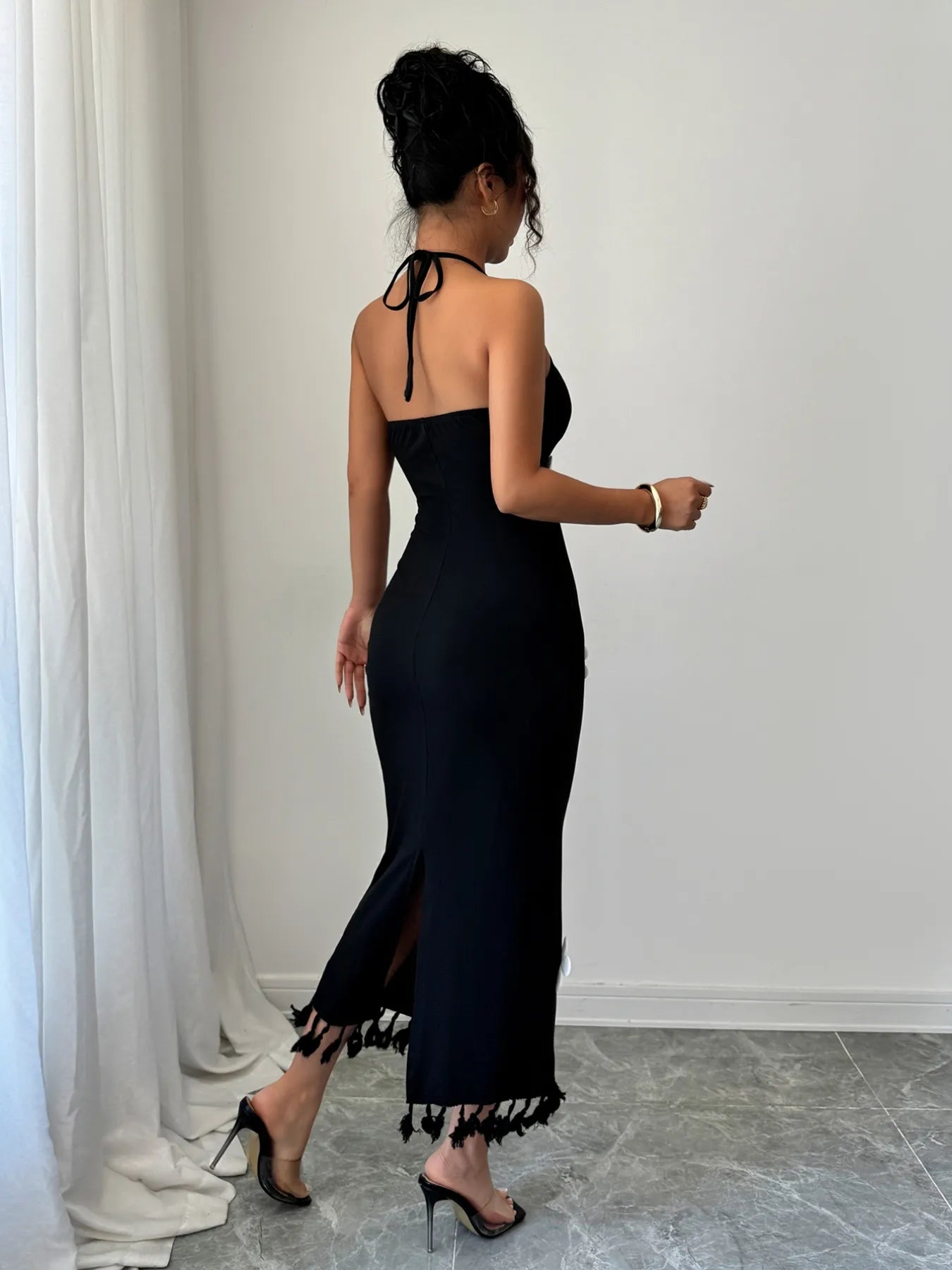 black flower halter neck dress midi with back tie open back and tassel fringe hem