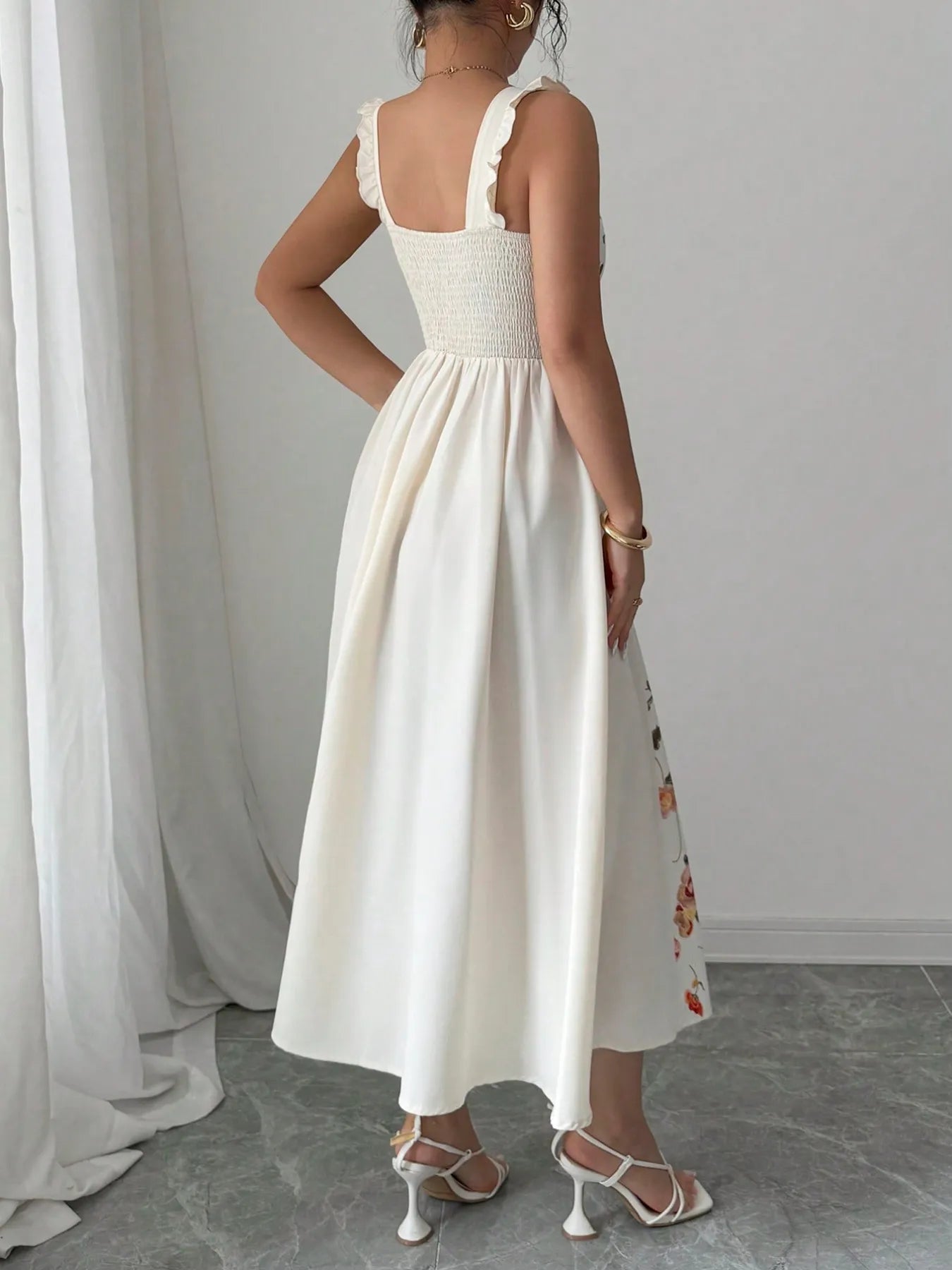 printed square neck midi dress back view smocked bodice ruffle straps white skirt with side floral print