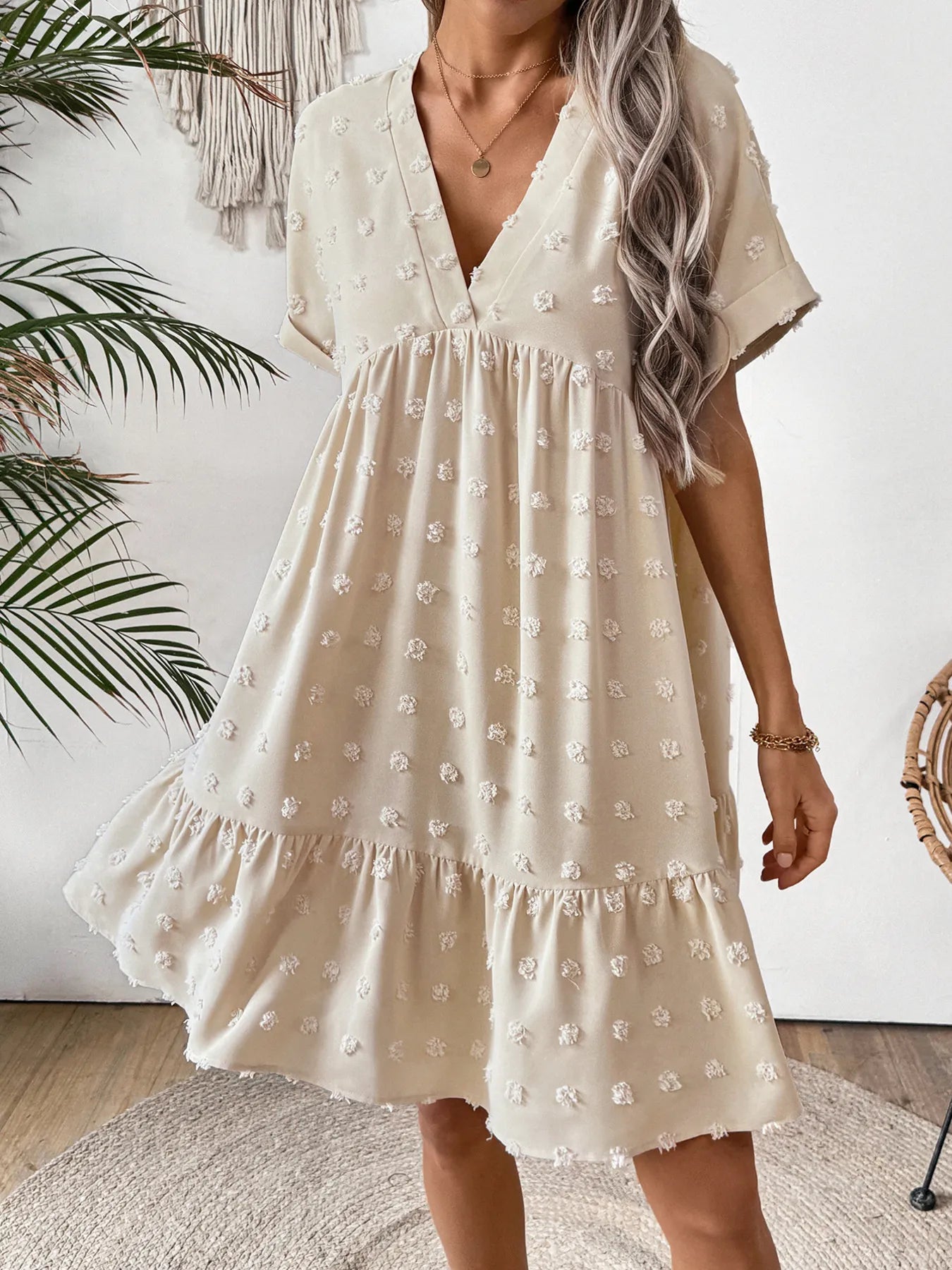 ruffled hem swiss dot mini dress in cream V neck short sleeves textured fabric babydoll silhouette