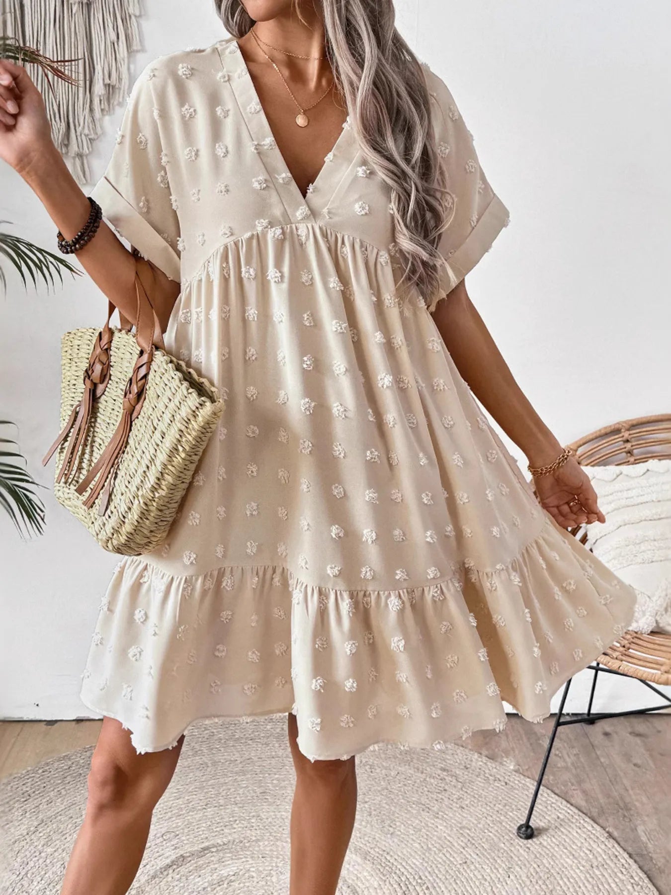 ruffled hem swiss dot mini dress cream V neck short sleeves babydoll silhouette with straw tote
