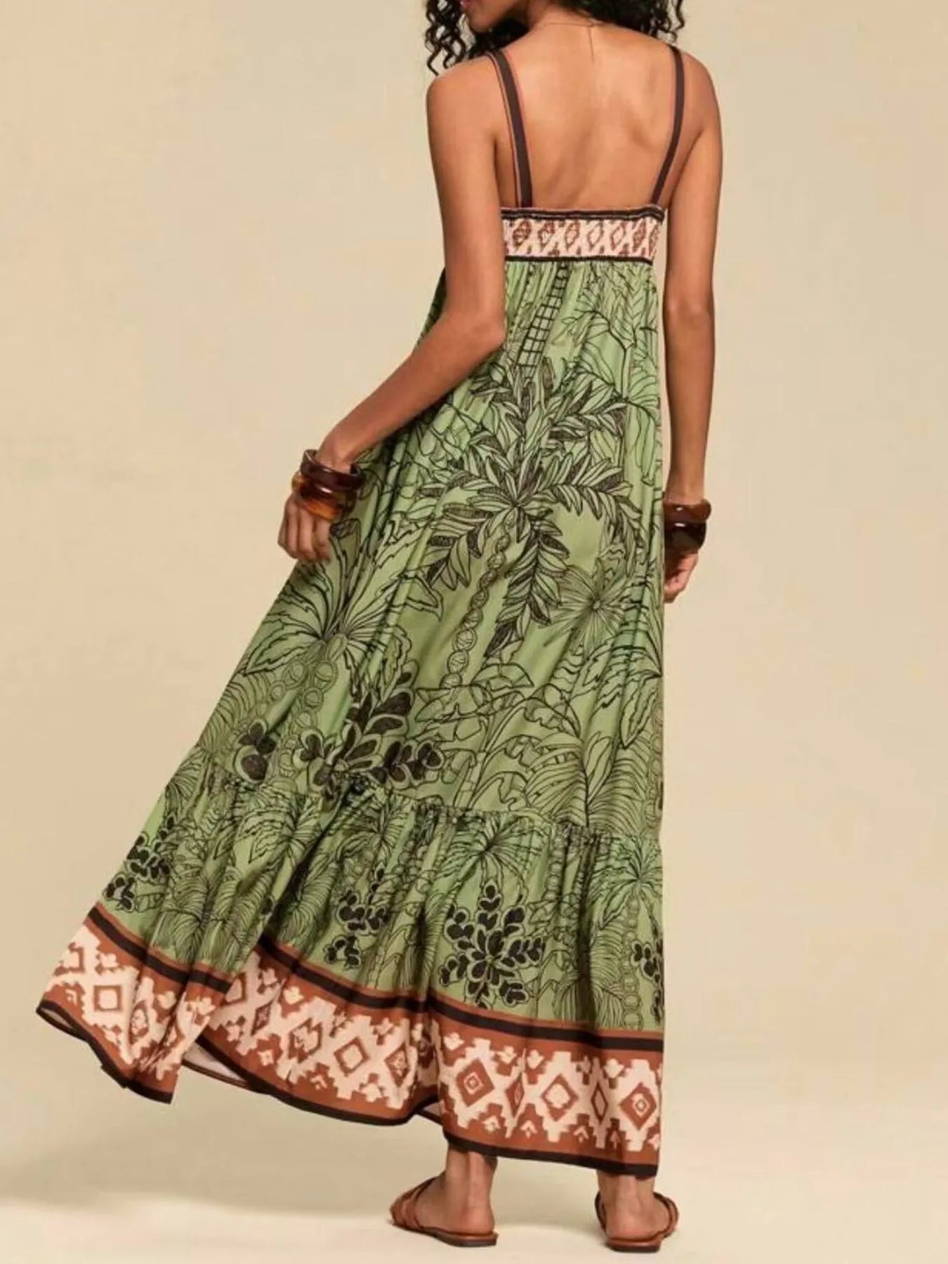 back view green tropical print maxi dress with thin straps smocked yoke and border hem