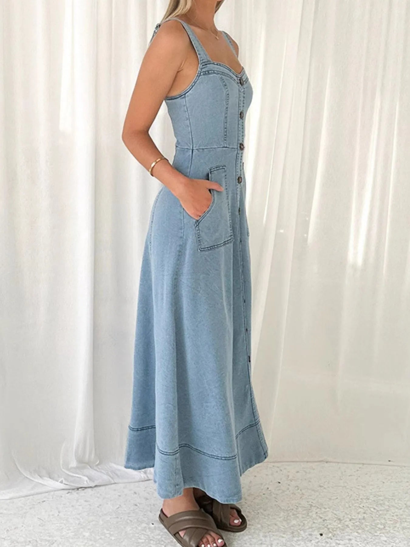 wide strap denim dress light wash button front A line midi with pockets side profile