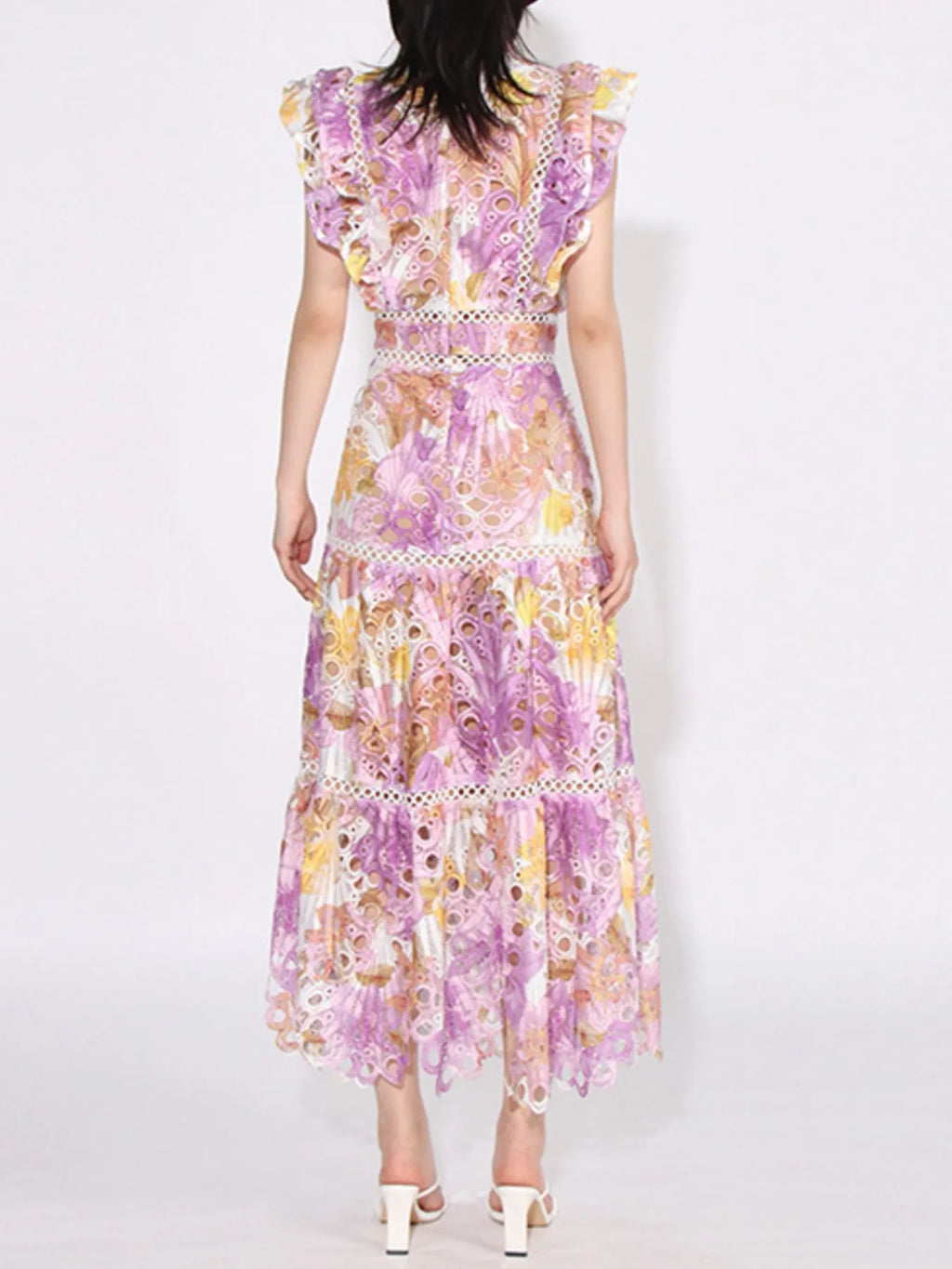 floral ruffled hollow out midi dress in pastel purple and yellow with tiered skirt and ruffle sleeves