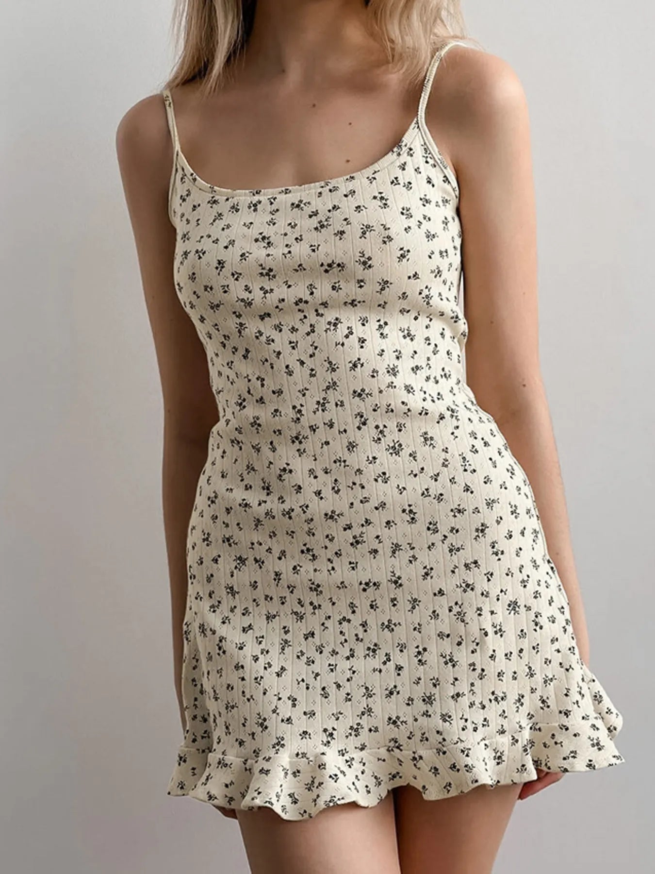 floral print cami lounge dress in cream with small black flowers ribbed texture fitted silhouette and ruffle hem
