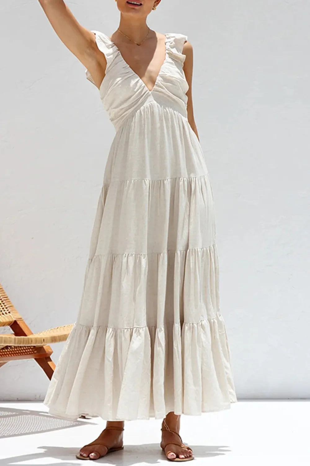 ruffled v-neck tiered dress in cream maxi with ruffle straps flowing tiers and flat sandals