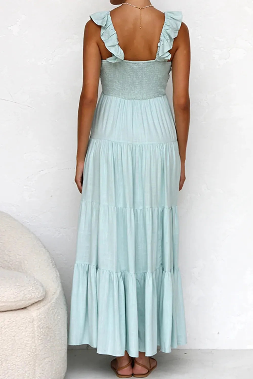 ruffled v-neck tiered dress in mint with smocked bodice, ruffle straps and flowing maxi tiers, back view
