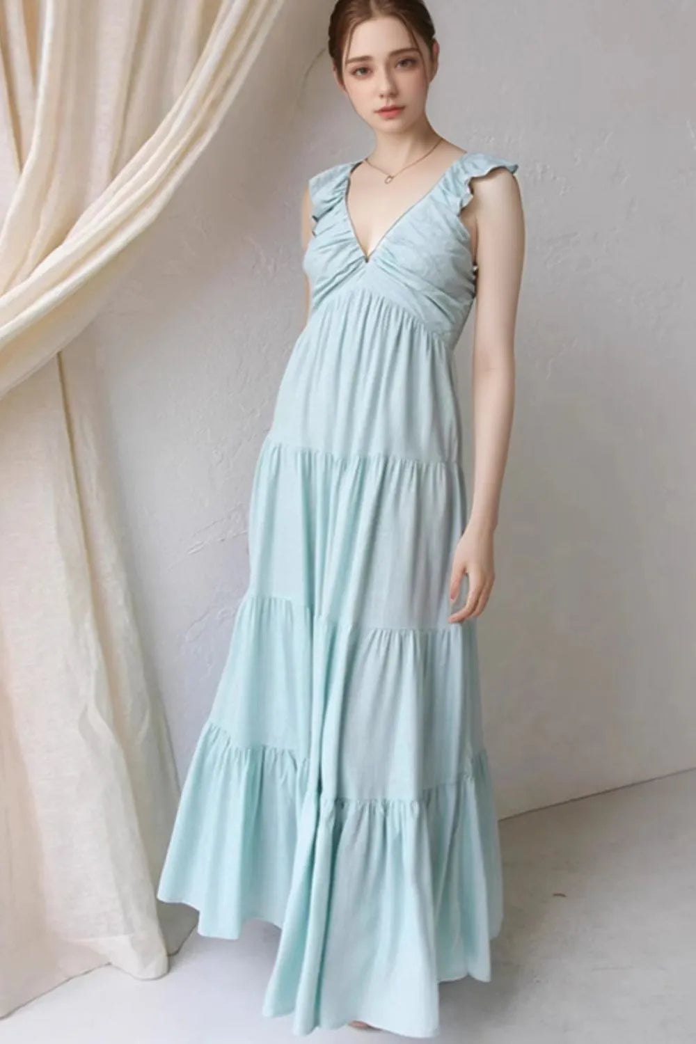 light blue ruffled v-neck tiered dress maxi with flutter straps and flowing tiers for summer events