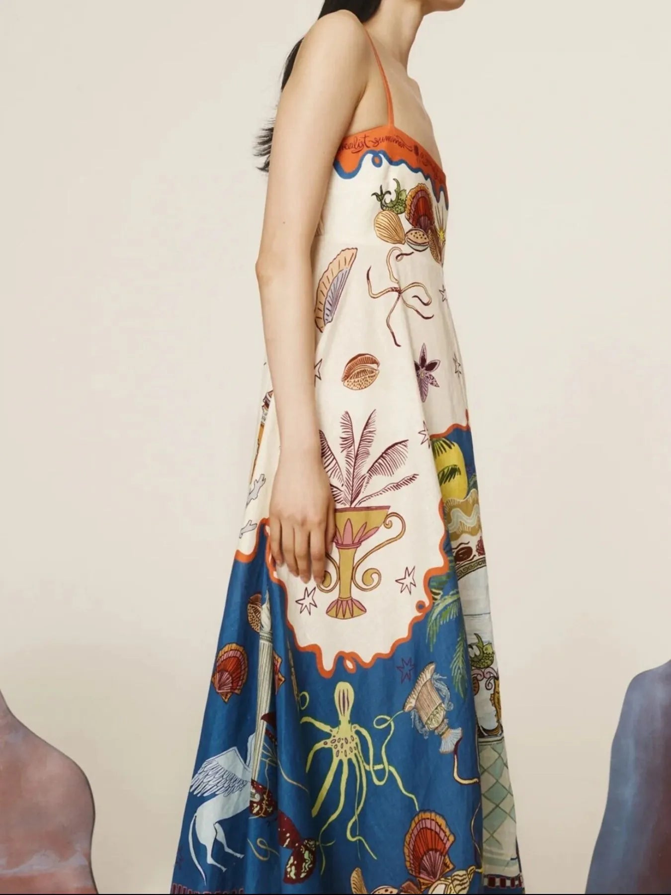 printed square neck maxi dress with ocean inspired print featuring octopus shells and thin straps side view