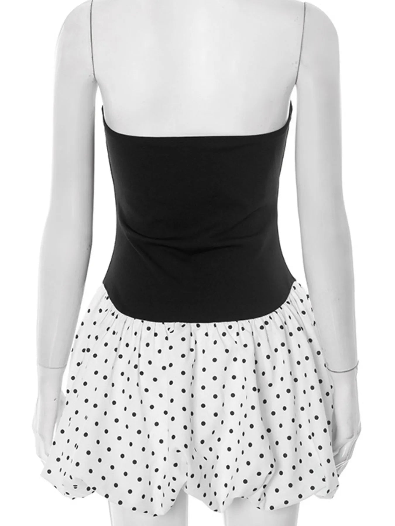 sweetheart neck polka dot mini dress back view black fitted bodice with white polka dot bubble skirt