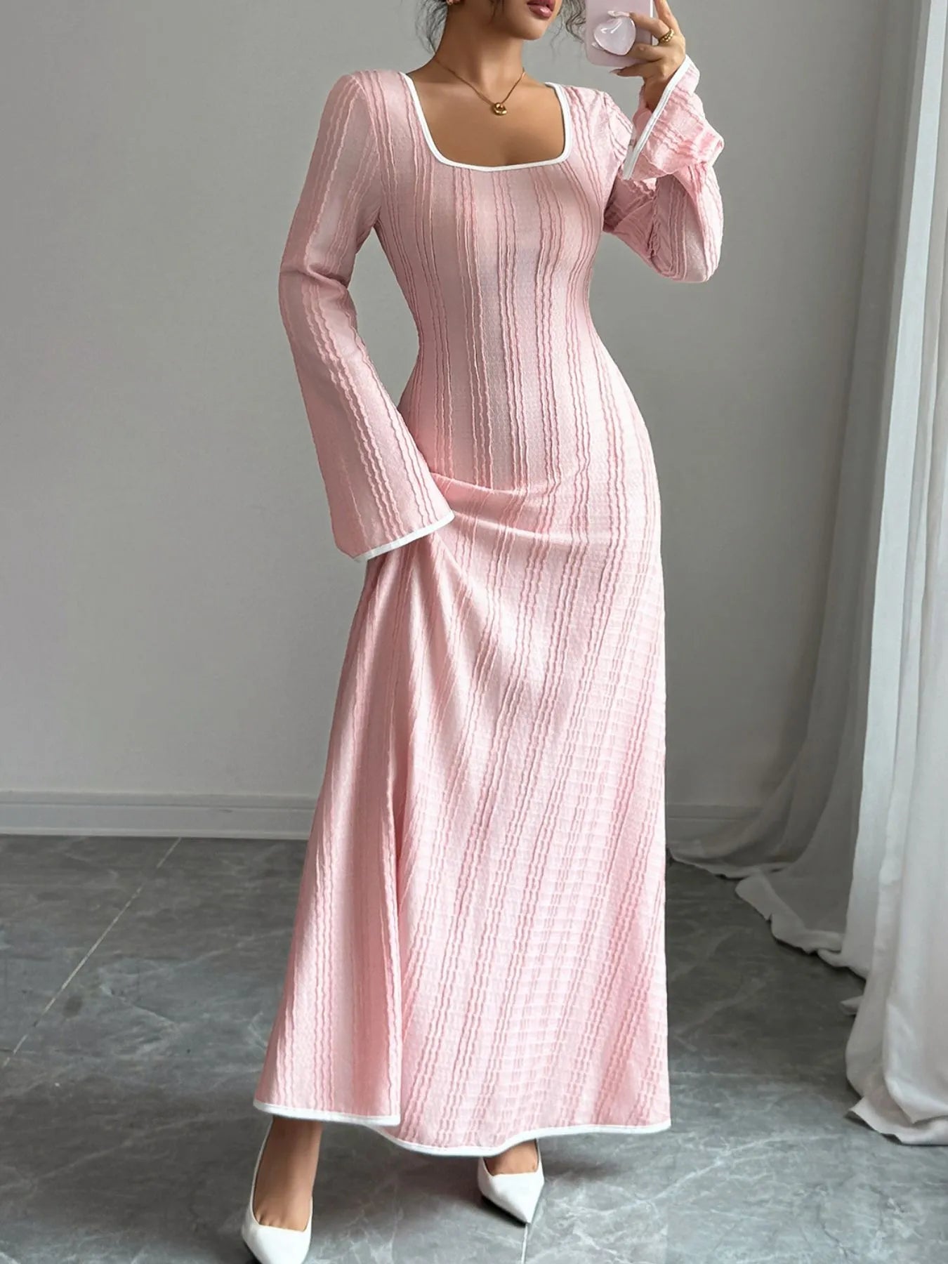 pink textured square neck maxi dress in ribbed knit with long bell sleeves white trim