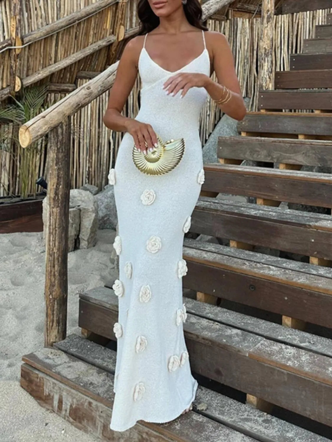 white flower maxi sweater cami dress with spaghetti straps and 3D flower appliques on beach