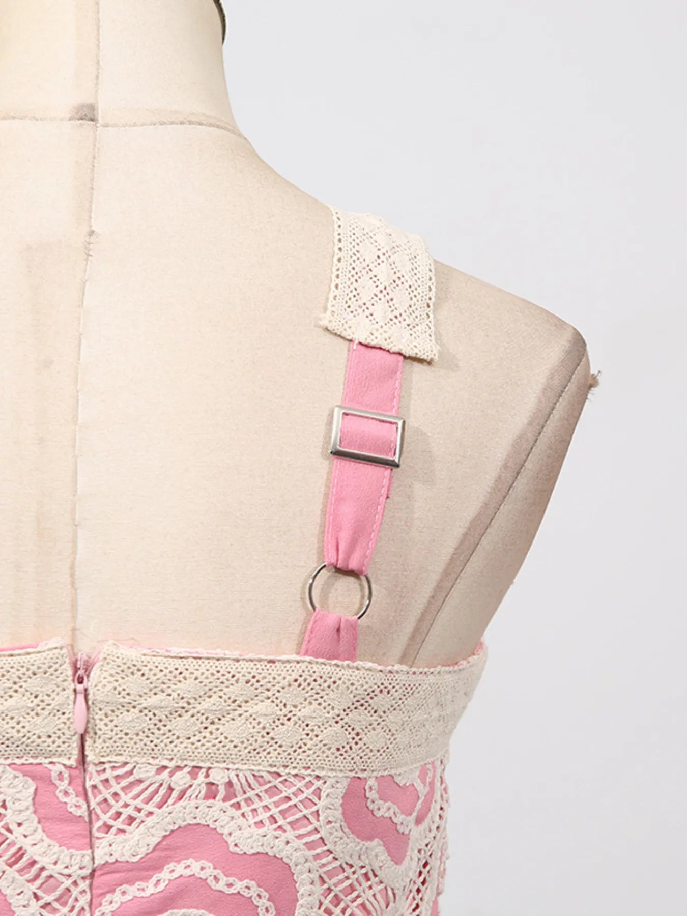 lace tiered midi dress back close up showing pink adjustable strap silver slider zipper and lace trim