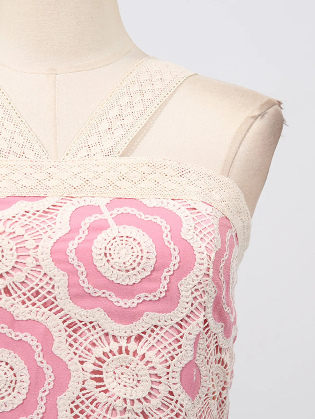 lace tiered midi dress close up of cream crochet lace floral bodice and wide straps on mannequin