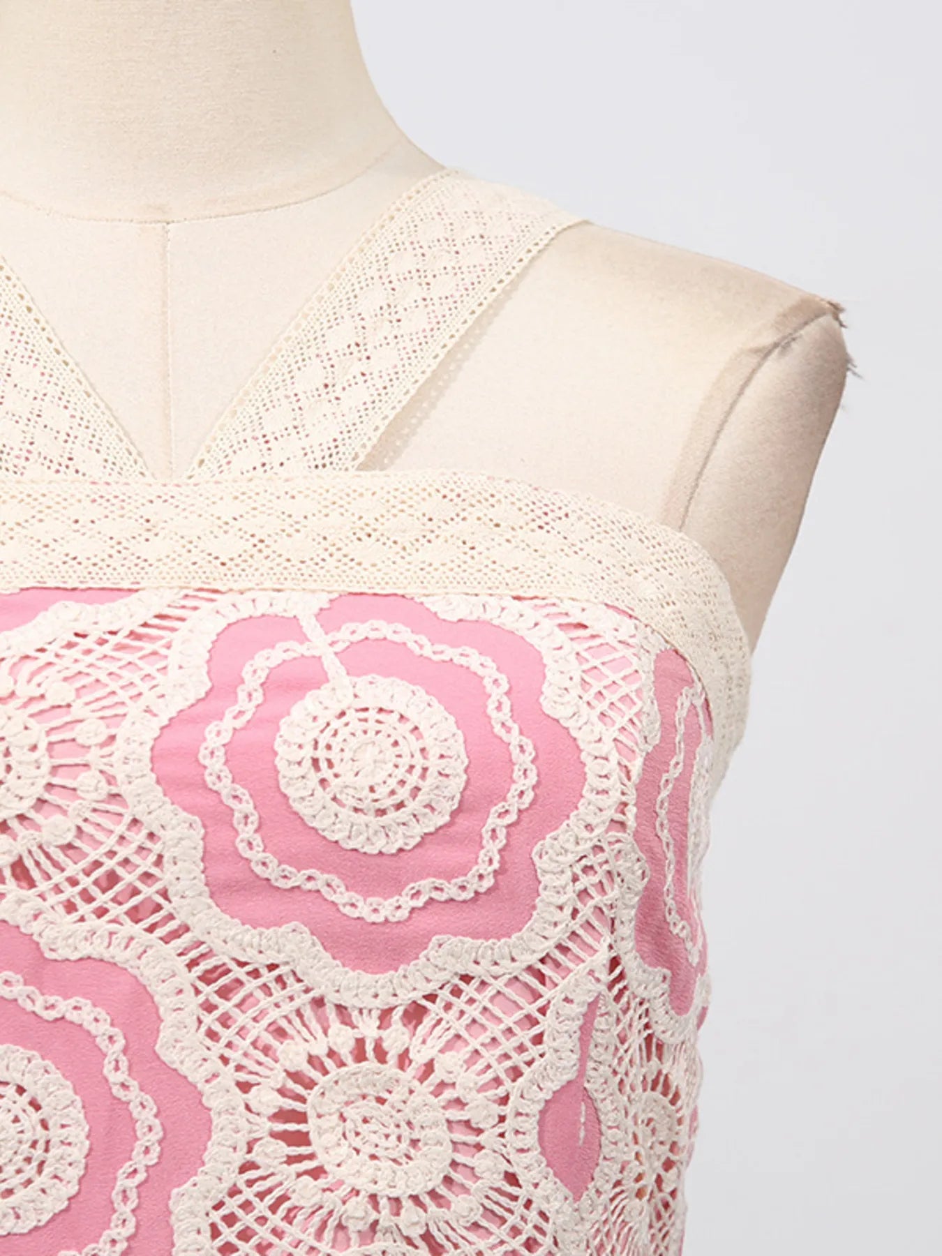 lace tiered midi dress close up of cream crochet lace floral bodice and wide straps on mannequin