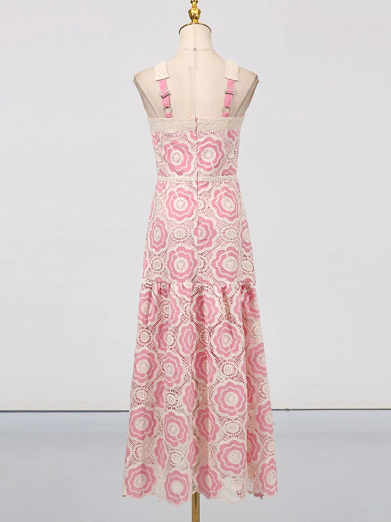 Back view  pink floral lace tiered midi dress with adjustable straps and fitted bodice