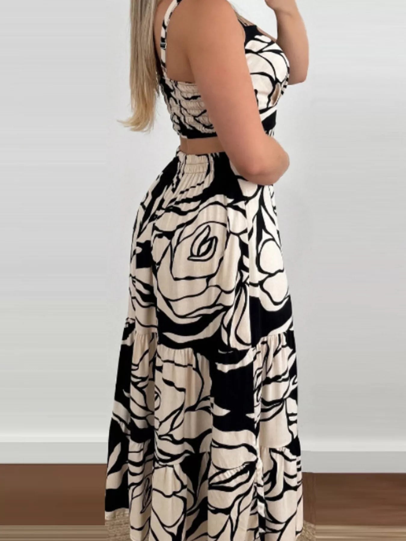 black and cream floral maxi cutout back cami dress with fitted bodice and tiered skirt