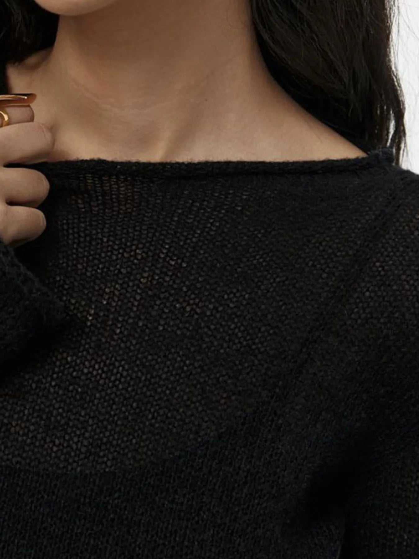 black sweater dress close up of boat neckline and semi sheer ribbed texture with ribbed knit cami dress set