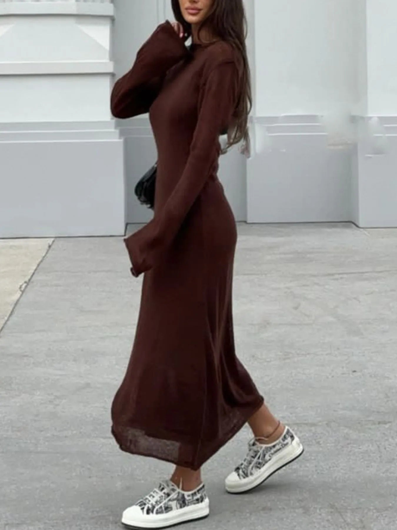 brown long sleeve knit maxi sweater dress with sneakers on model walking ribbed knit cami dress set