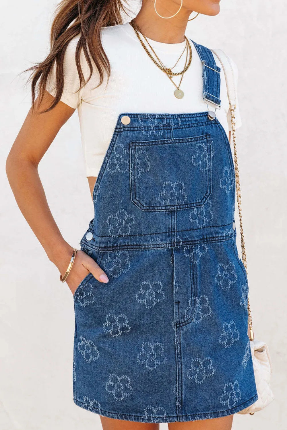 flower print denim overall dress short A line style with front pocket worn over white tee