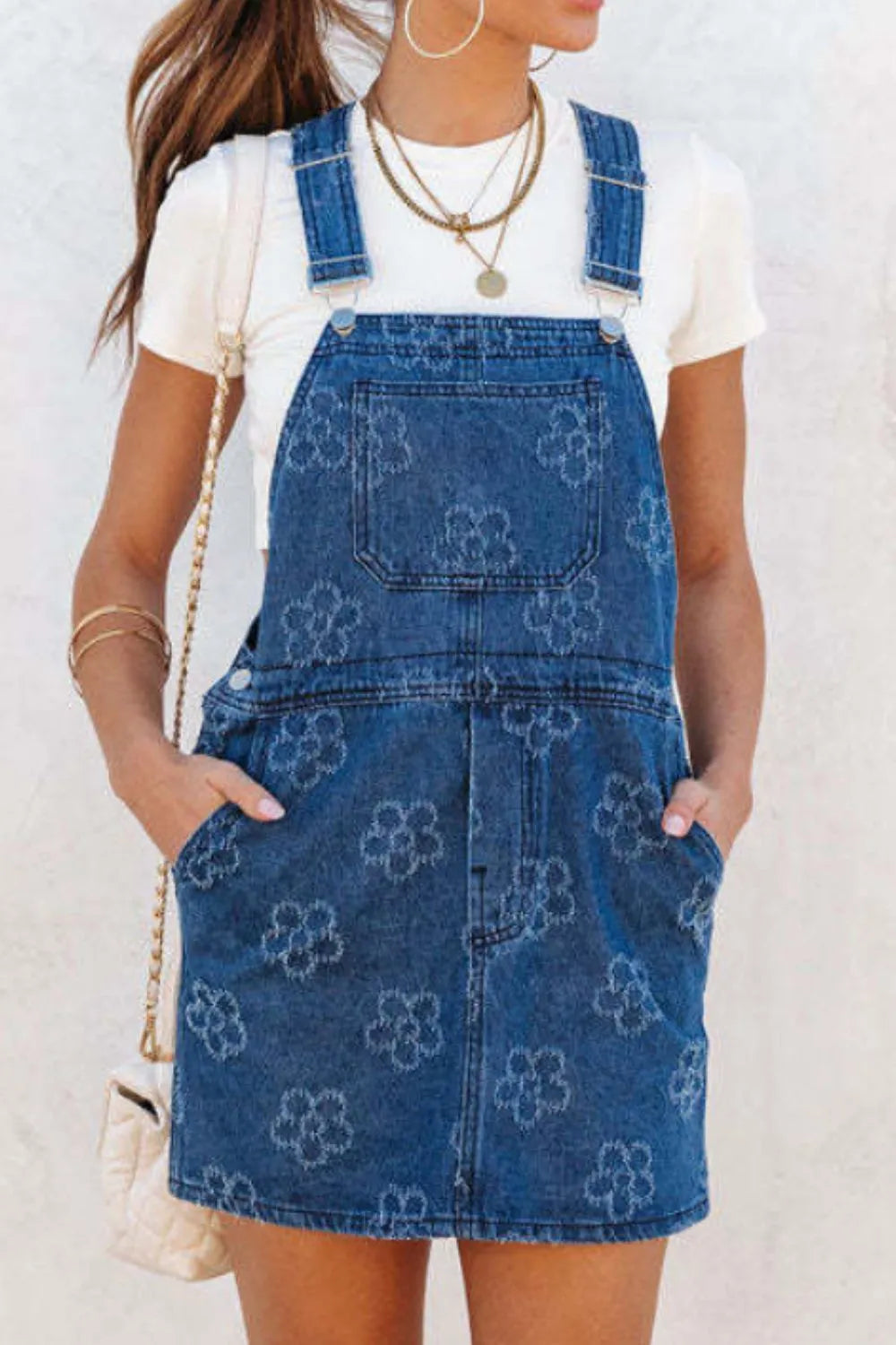 flower print denim overall dress with front pocket adjustable straps side pockets styled with white tee