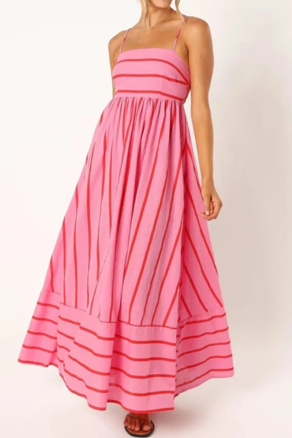 pink striped square neck cami dress with thin straps and flowy maxi skirt