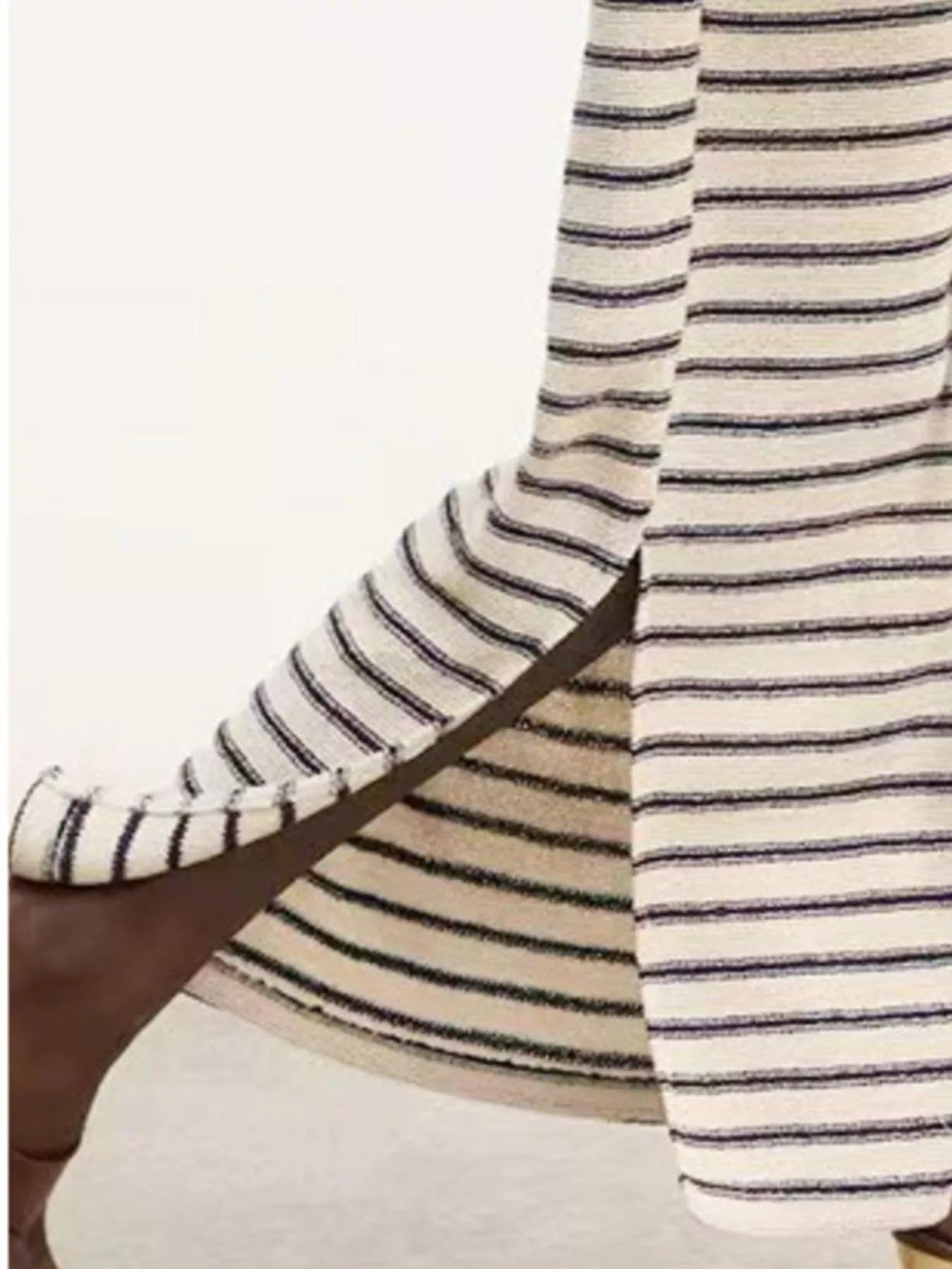 knit striped maxi dress for women with side slit showing ankle and brown boot